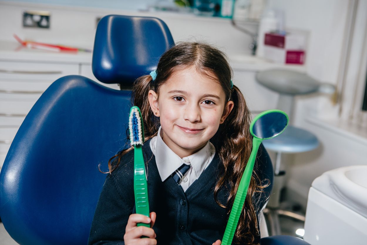 child with toothbrush
